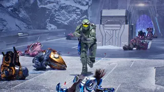 Halo Campaign Evolved: Master Chief running towards the camera with various dead Covenant on the ground.