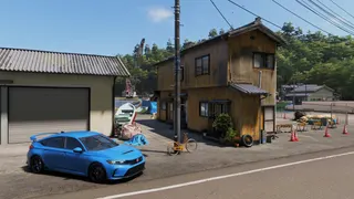 A Honda Civic parked outside a house in Forza Horizon 6.