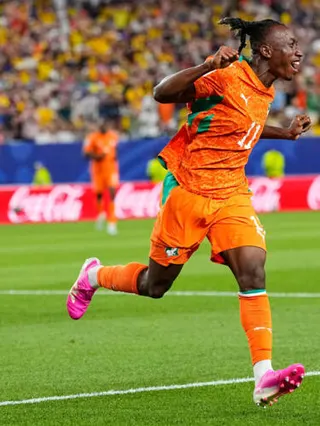 Ivory Coast's Yan Diomande (11) celebrates after teammate Amad Diallo scored their first goal during the World Cup Group E soccer match between Ivory Coast and Ecuador in Philadelphia, Sunday, June 14, 2026.