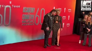 Jelly Roll and Bunnie XO walk the red carpet together at the 2025 ACM Awards