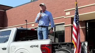 Mike Collins standing outdoors in Woodstock, Georgia.