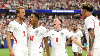 England's Harry Kane celebrates with team-mates after opening the scoring against Croatia