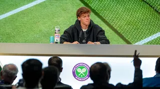 Jannik Sinner speaks at a news conference during the 2025 Wimbledon Championships