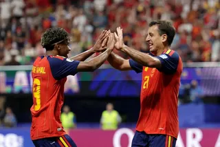 Lamine Yamal and Mikel Oyarzabal high five