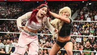 Liv Morgan and Iyo Sky wrestling in a ring at The O2 Arena in London