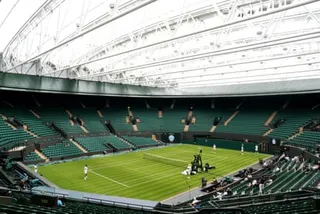 Novak Djokovic and world No 1 Jannik Sinner warm-up for Wimbledon under the roof of No 1 Court