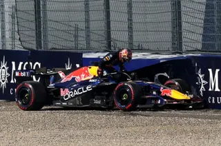 Max Verstappen climbs out of his Red Bull after crashing during qualifying at the Red Bull Ring