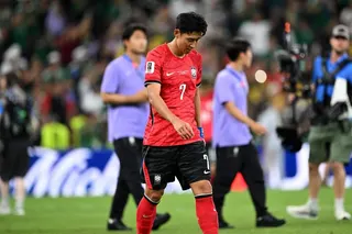 South Korea’s Son Heung-min leaves the field with his head bowed after his side’s loss to South Africa. Photo: Xinhua