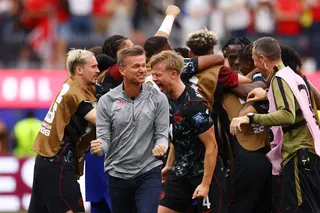Canada’s Stephen Eustaquio celebrates scoring their first goal with teammates as coach Jesse Marsch reacts.
