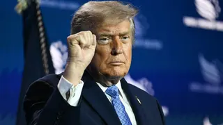 President Trump pumps fist in air at Faith & Freedom Coalition.