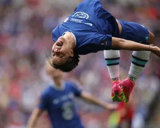 Sam Kerr, the Australian striker, does a backwards somersault to celebrate scoring for Chelsea against Manchester United in the 2023 Women's FA Cup final at Wembley.