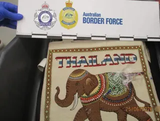 An airline employee from Thailand has been charged after Australian authorities allegedly found more than 1kg of heroin concealed in her luggage at Melbourne Airport. — Australian Border Force pic