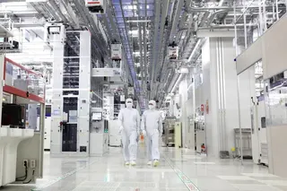 Workers walk through Samsung Electronics’ chip production plant at Pyeongtaek, South Korea. Photo: Samsung Electronics/Reuters
