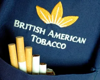 Cigarettes in a British American Tobacco worker’s shirt pocket