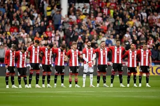 Sheffield United players line up for a one-minute silence to remember Maddy Cusack