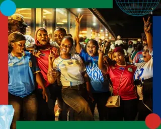 Congolese football fans gather to watch the broadcast of the Portugal vs Democratic Republic of Congo
