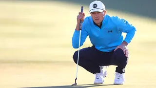 Jordan Spieth lining up a putt on the tenth green at TPC Scottsdale.