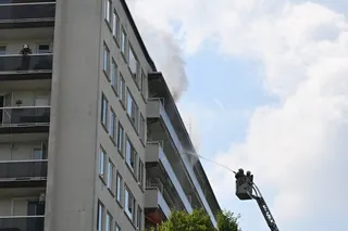 Firefighters try to extinguish a fatal fire in an apartment building in Antwerp, Belgium, on Wednesday. Photo: via Xinhua