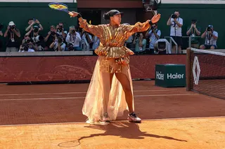 Naomi Osaka wearing a shimmering golden dress at the French Open