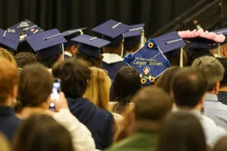 students in graduation caps and gowns