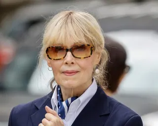 a woman in dark glasses