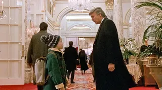 Screenshot from Home Alone 2, where Kevin, played by Macaulay Culkin, 
bumps into Donald Trump in the lobby of the Plaza Hotel