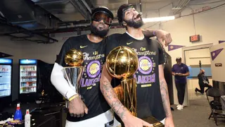 LeBron James and Anthony Davis smoking cigars after winning the 2020 NBA Championship