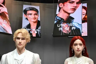 Humanoid robots are displayed during the launch of the U1 humanoid robot produced by UWORLD, a brand under UBTECH Robotics, in Shenzhen, China's Guangdong province on June 30, 2026. Silicone skin, soothing voice: Chinese company UBTech unveiled unprecedented hyper-realistic human-looking androids equipped with artificial intelligence (AI) and presented as anti-loneliness remedies. (Photo by ADEK BERRY / AFP)