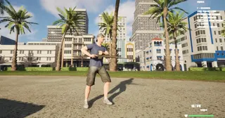 Guy on beach holding a rifle with city in the background