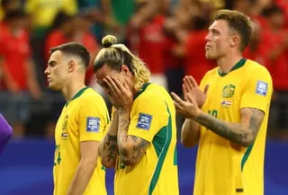 Jackson Irvine with his head in his hands