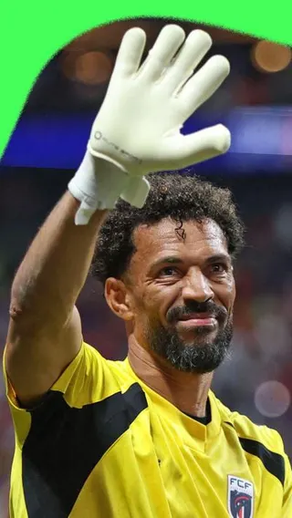 Cape Verde goalkeeper, Vozinha waves after facing Spain in World Cup opener