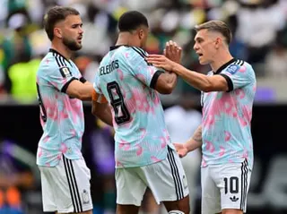 A heated exchange between Belgium's Leandro Trossard and Youri Tielemans