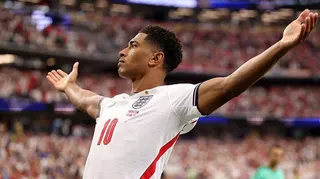Jude Bellingham celebrates scoring for England at the World Cup
