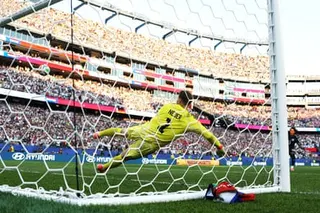 Manuel Neuer watches the winning Paraguay penalty, taken by José Canale, go past him.