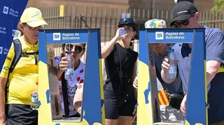 Tour de France stage one: fans get water in Barcelona