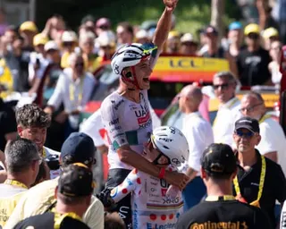 Isaac del Toro celebrates his stage victory with teammate Tadej Pogacar