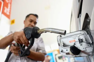 A motorist filling up using the Budi Diesel initiative at a petrol station in Putrajaya. -- NSTP/ AHMAD UKASYAH
