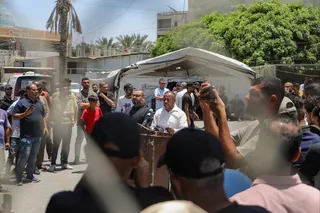 Ismail al-Thawabta (middle right), head of Hamas’ government media office, addresses a press conference at the Al-Aqsa hospital in the central Gaza Strip on Monday. Hamas announced on Monday the dissolution of the body that has governed the Gaza Strip for nearly two decades. Photo: EPA