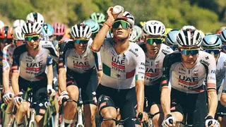 Isaac del Toro pours water on his head during stage two of the 2026 Tour de France