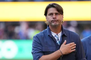 An apologetic Mauricio Pochettino acknowledges supporters after the USA’s World Cup defeat by Belgium. Photo: AP Photo