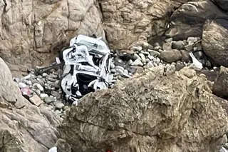The Tesla car that plunged off a northern California cliff along the Pacific Coast Highway in January 2023, near an area known as Devil’s Slide. Photo: San Mateo County Sheriff’s Office via AP