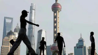 China says economists who spread 'inappropriate' views should be fired