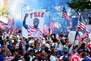 United States fans gather before the match with a Folarin Balogun banner in Seattle