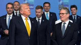 Donald Trump and Sir Keir Starmer stood with other Nato leaders