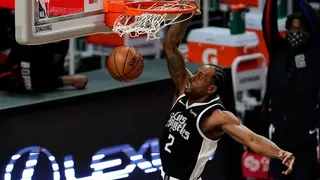 Los Angeles Clippers forward Kawhi Leonard (2) dunks against the Chicago Bulls during the second half of an NBA basketball game Sunday, Jan. 10, 2021, in Los Angeles. (AP Photo/Marcio Jose Sanchez)