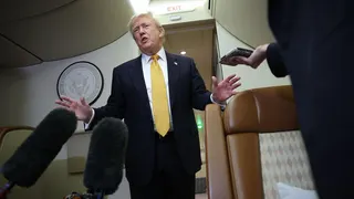 President Donald Trump speaks to members of the press for the first time aboard the new Air Force One while in flight from RAF Mildenhall AFB to Joint Base Andrews July 8, 2026 after leaving the United Kingdom.