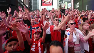 Norway fans performing the Viking row in Times Square New York