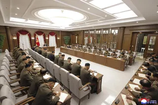 This picture released by North Korea's official Korean Central News Agency (KCNA) shows North Korean leader Kim Jong Un attending the First Enlarged Meeting of the Ninth Central Military Commission of the Workers' Party of Korea at the government complex No. 1 in Pyongyang
