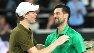 Jannik Sinner congratulates Novak Djokovic after their Australian Open semi-final