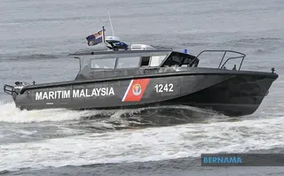 The Malaysian Maritime Enforcement Agency in Penang detained a tanker suspected of colliding with a local fishing vessel off Bagan Datuk, Perak. — Bernama pic